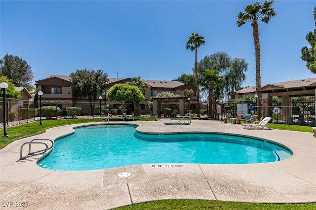 5751 E Hacienda Ave Unit 105, Las Vegas, NV 89122 - community pool with a patio area