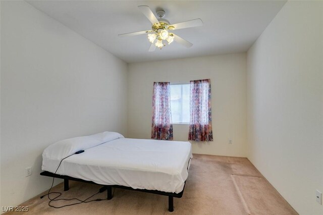 5751 E Hacienda Ave Unit 105, Las Vegas, NV 89122 - bedroom with carpet flooring and a ceiling fan