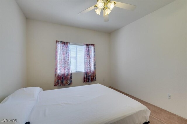 5751 E Hacienda Ave Unit 105, Las Vegas, NV 89122 - carpeted bedroom featuring ceiling fan