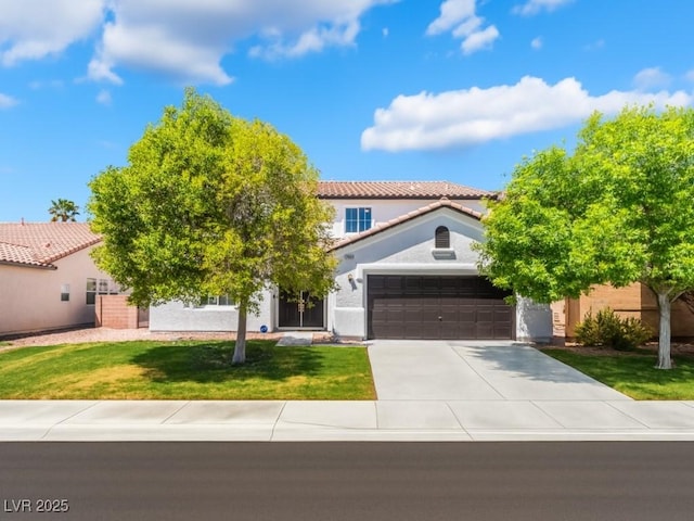 view of front of home with a tiled roof, driveway, a front lawn, an attached garage, and stucco siding