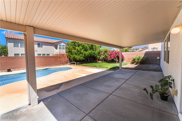view of patio / terrace featuring a fenced in pool and a fenced backyard
