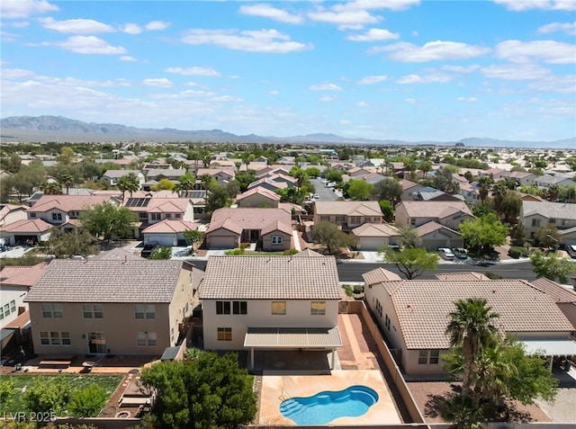 bird's eye view featuring a residential view and a mountain view