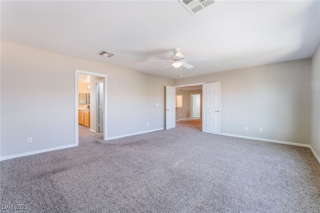 unfurnished bedroom with visible vents and light carpet