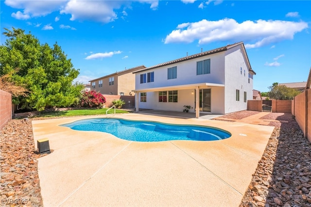 view of pool with a fenced in pool, a fenced backyard, and a patio area