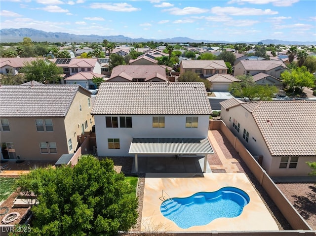 aerial view featuring a residential view and a mountain view