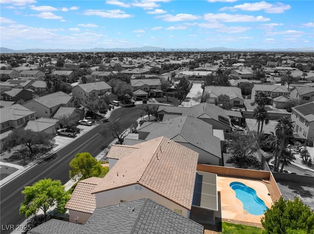 bird's eye view with a residential view and a mountain view