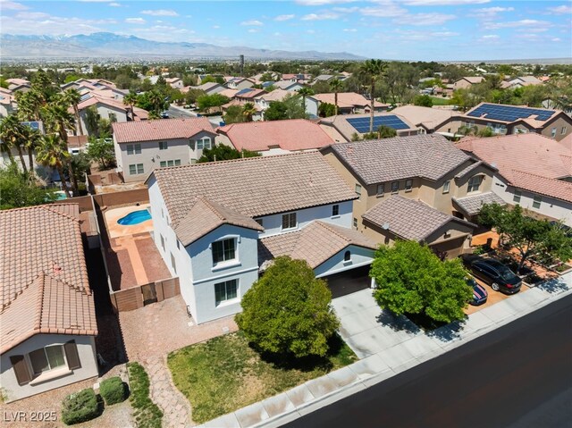 birds eye view of property featuring a residential view and a mountain view
