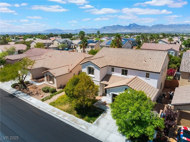 bird's eye view with a residential view and a mountain view