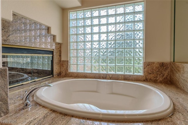 bathroom featuring a bath