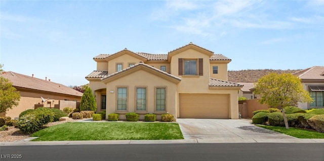 17 Morninglow Pass, Henderson, NV 89052 - mediterranean / spanish house featuring stucco siding, fence, a garage, a tile roof, and concrete driveway