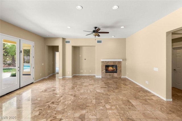 17 Morninglow Pass, Henderson, NV 89052 - unfurnished living room with recessed lighting, a fireplace, a ceiling fan, visible vents, and baseboards