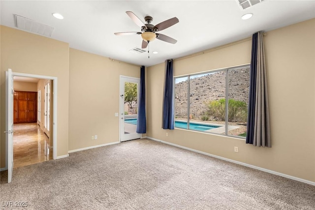 17 Morninglow Pass, Henderson, NV 89052 - unfurnished room featuring visible vents, a ceiling fan, and carpet flooring