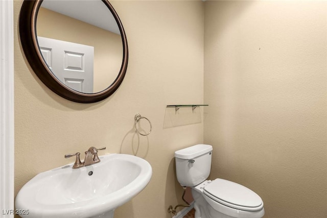 17 Morninglow Pass, Henderson, NV 89052 - half bathroom with toilet and a sink