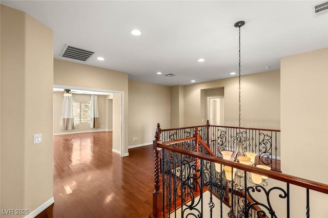 17 Morninglow Pass, Henderson, NV 89052 - corridor with recessed lighting, an upstairs landing, visible vents, and wood finished floors