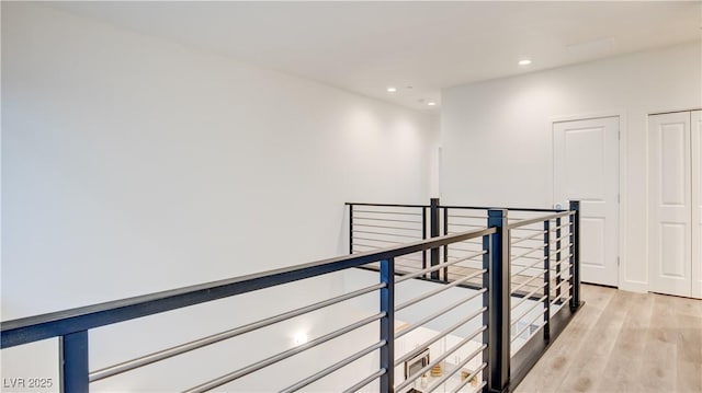 1187 Blossom Point St Unit 36, Las Vegas, NV 89135 - hallway with an upstairs landing, recessed lighting, and light wood finished floors