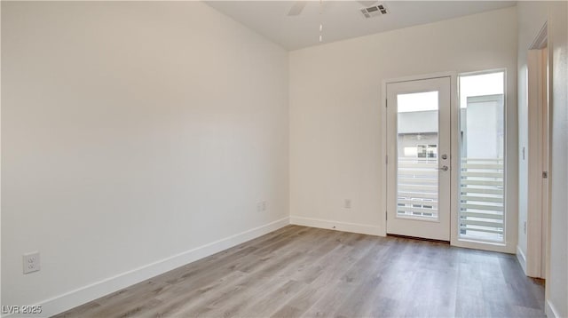 1181 Blossom Point St, Las Vegas, NV 89135 - unfurnished room featuring visible vents, a ceiling fan, light wood finished floors, and baseboards
