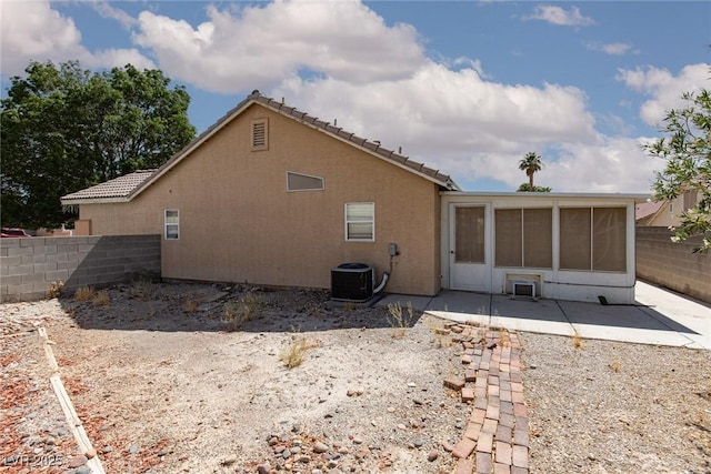 2631 Bed Knoll Ct, North Las Vegas, NV 89031 - rear view of property with a patio, a sunroom, and stucco siding