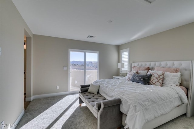 bedroom with baseboards, visible vents, access to exterior, and light colored carpet