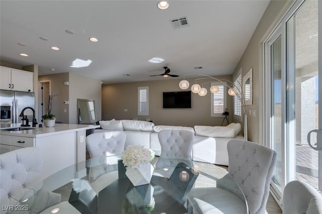 dining space with visible vents, recessed lighting, and a ceiling fan
