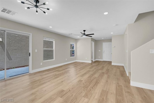 unfurnished living room featuring visible vents, light wood-type flooring, recessed lighting, and baseboards