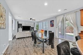 dining space featuring a ceiling fan, baseboards, recessed lighting, and wood finished floors