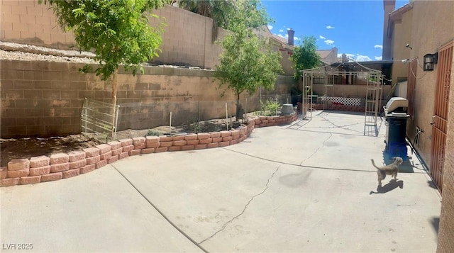 6429 Rosemount Ave, Las Vegas, NV 89156 - fenced backyard with a patio area