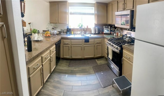 6429 Rosemount Ave, Las Vegas, NV 89156 - kitchen with stainless steel appliances and a sink