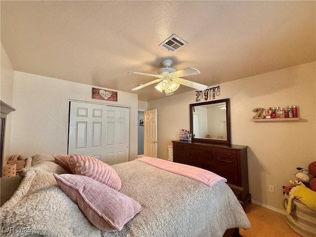 2986 Matese Dr, Henderson, NV 89052 - bedroom with a ceiling fan, light colored carpet, visible vents, baseboards, and a closet