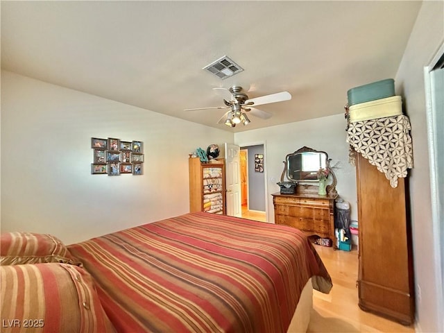 2986 Matese Dr, Henderson, NV 89052 - bedroom featuring a ceiling fan, wood finished floors, and visible vents