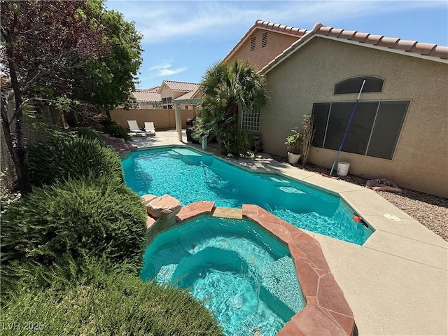 2986 Matese Dr, Henderson, NV 89052 - view of swimming pool with a patio, a fenced backyard, and a pool with connected hot tub