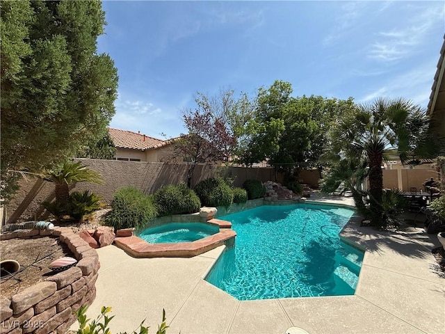 2986 Matese Dr, Henderson, NV 89052 - view of swimming pool with a pool with connected hot tub, a fenced backyard, and a patio area