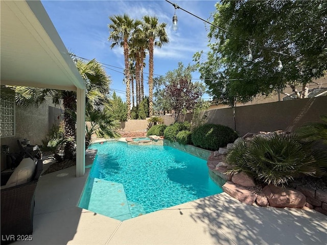 2986 Matese Dr, Henderson, NV 89052 - view of pool with a fenced backyard, a fenced in pool, and a hot tub