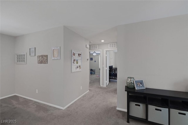 corridor with baseboards, visible vents, carpet, and recessed lighting