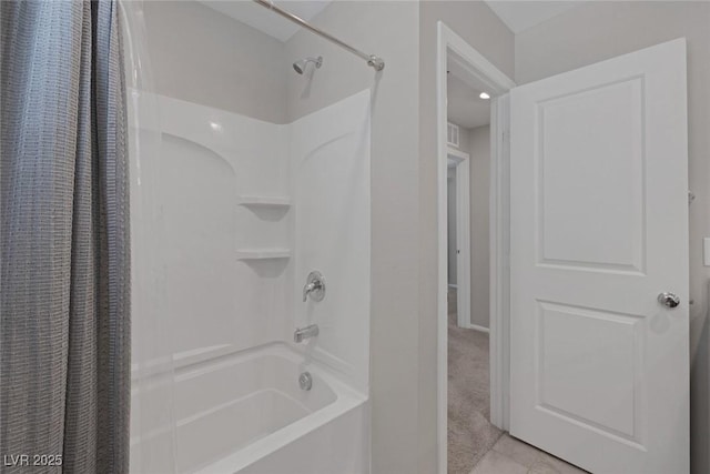 bathroom featuring visible vents, shower / bathtub combination with curtain, tile patterned flooring, and baseboards