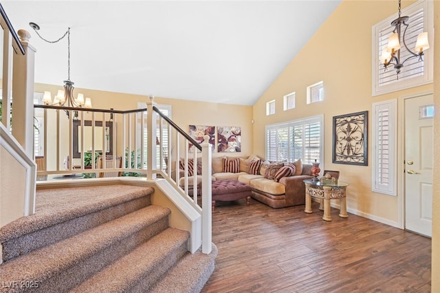 3295 Cooper Creek Dr, Henderson, NV 89074 - interior space featuring wood finished floors, high vaulted ceiling, a notable chandelier, and stairs