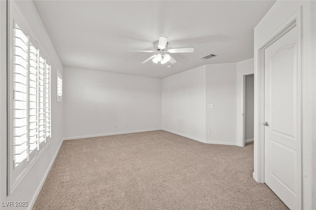 3295 Cooper Creek Dr, Henderson, NV 89074 - carpeted spare room featuring visible vents, a ceiling fan, and baseboards