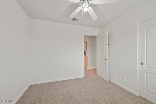 3295 Cooper Creek Dr, Henderson, NV 89074 - unfurnished bedroom with light colored carpet, visible vents, ceiling fan, and baseboards