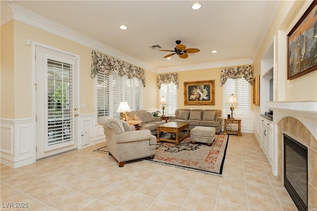 living area featuring recessed lighting, a tile fireplace, light tile patterned floors, visible vents, and a ceiling fan