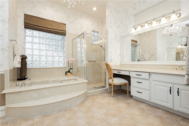 full bath featuring a shower stall, vanity, a garden tub, tile patterned flooring, and wallpapered walls