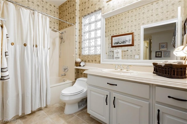 bathroom featuring tile patterned flooring, wallpapered walls, shower / bath combo with shower curtain, toilet, and vanity