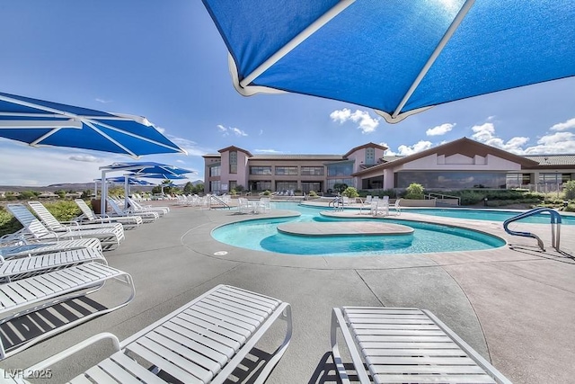 pool featuring a patio area