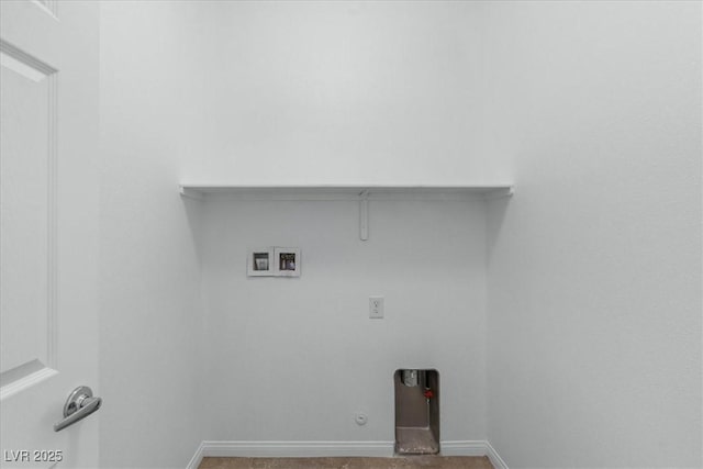 clothes washing area featuring washer hookup, gas dryer hookup, baseboards, and carpet floors