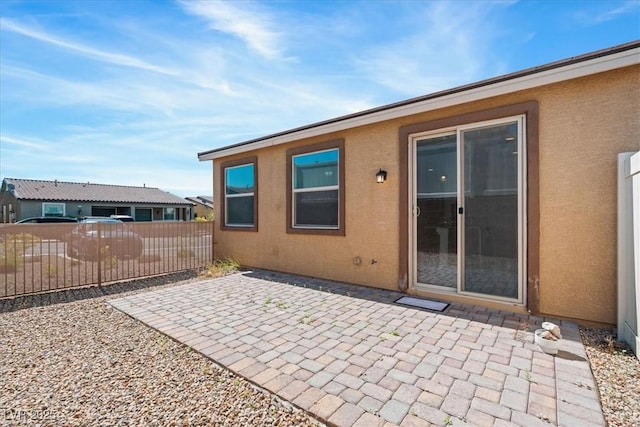 view of patio / terrace featuring fence