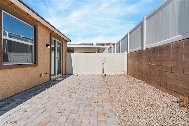 view of patio with fence