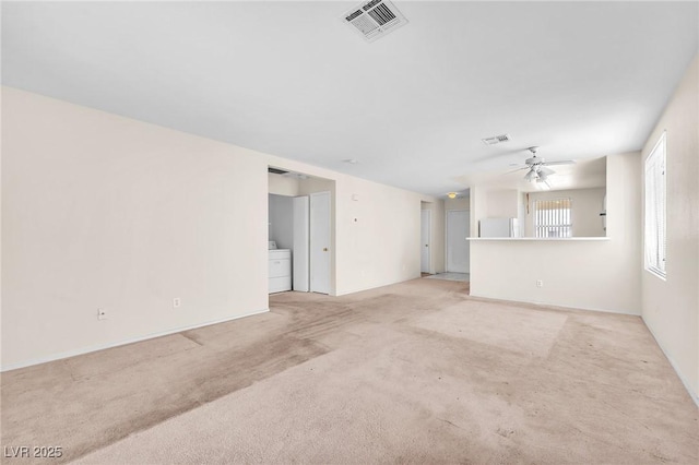 719 Roberta Alecia Ave, North Las Vegas, NV 89031 - unfurnished living room with ceiling fan and light colored carpet
