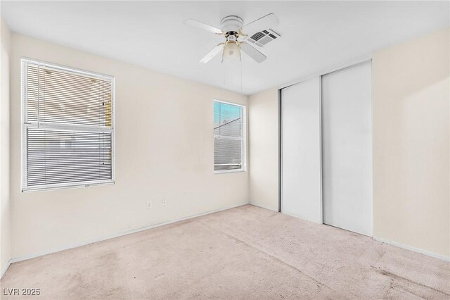 719 Roberta Alecia Ave, North Las Vegas, NV 89031 - unfurnished bedroom with carpet floors, a closet, and ceiling fan
