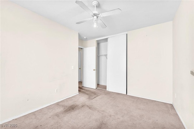 719 Roberta Alecia Ave, North Las Vegas, NV 89031 - unfurnished bedroom featuring carpet floors, a closet, a ceiling fan, and baseboards