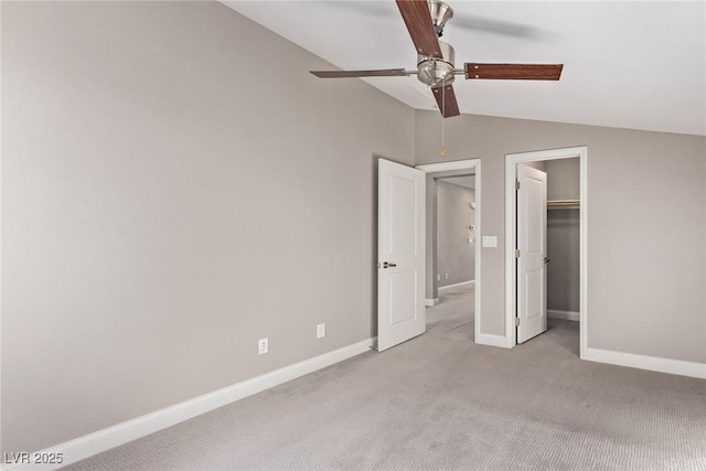 8797 Pinley Spring St, Las Vegas, NV 89113 - unfurnished bedroom with lofted ceiling, carpet flooring, baseboards, a ceiling fan, and a spacious closet