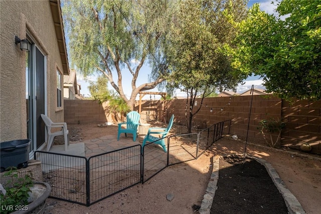 view of patio featuring a fenced backyard