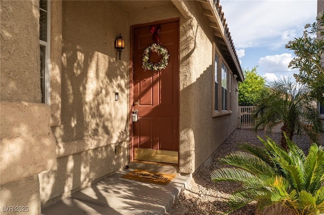 view of side of home featuring stucco siding